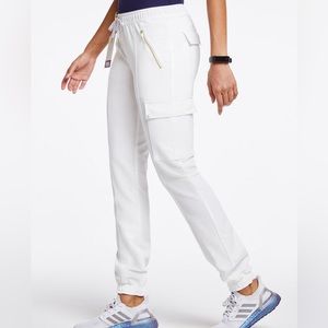 Jaanuu Women’s Essential Gold Zip Jogger in White